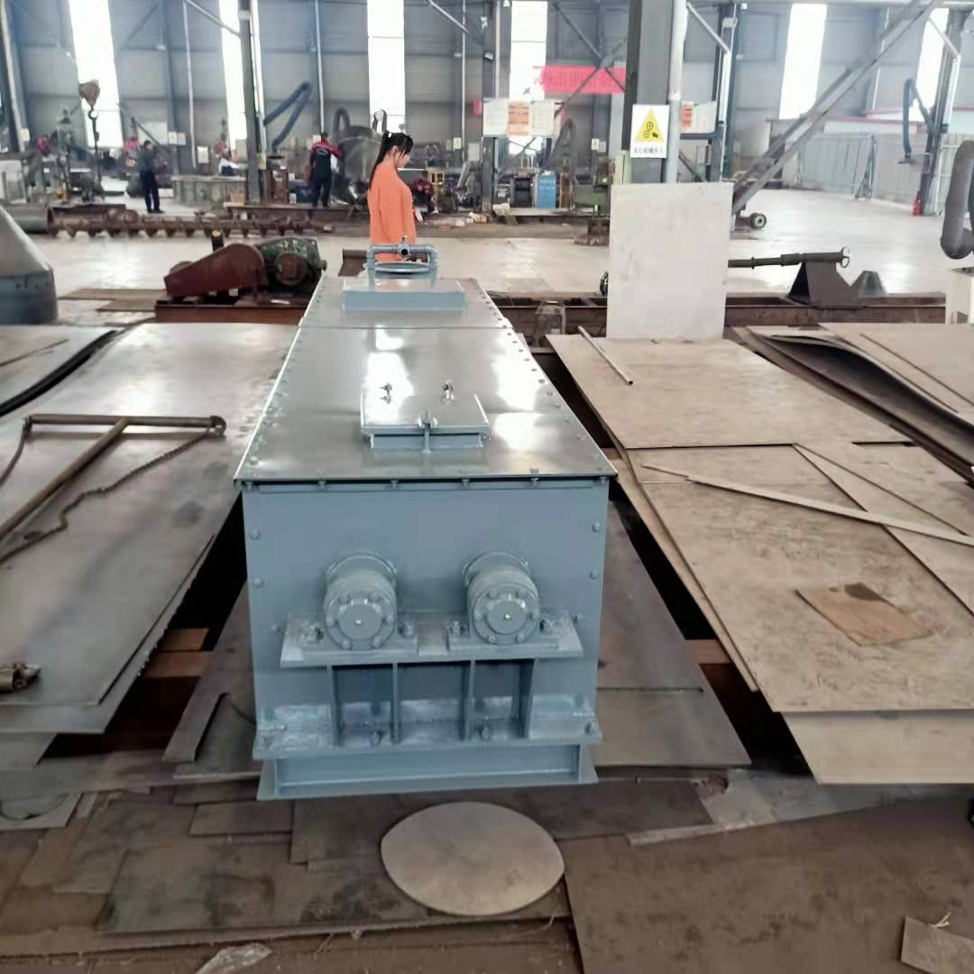 双轴粉尘加湿机的工作原理